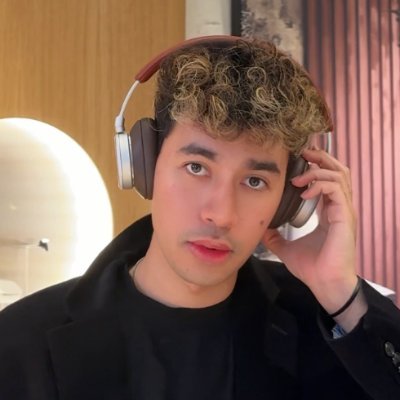Adam Syed wearing headphones